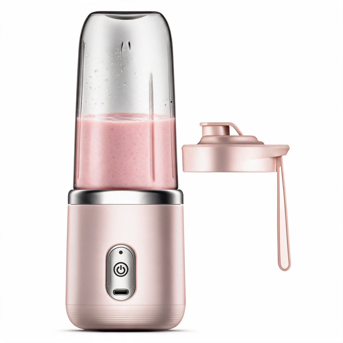 Portable blender making a fruit smoothie